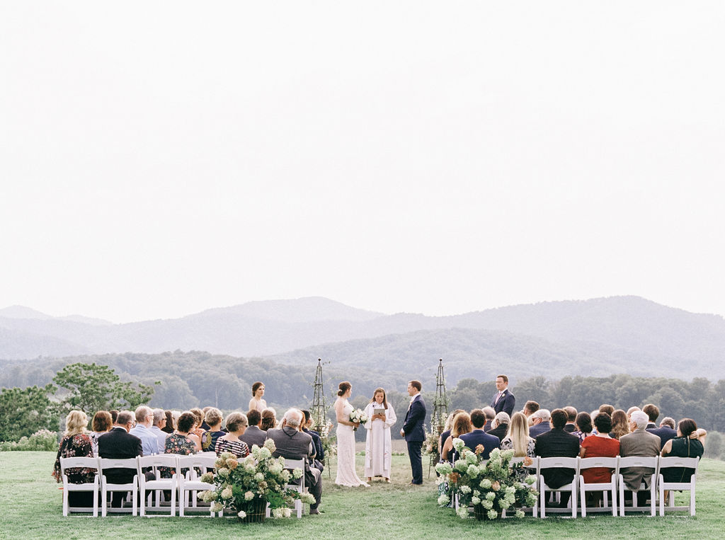 A dreamy and romantic Pippin Hill Wedding in Charlottesville, Virginia. The hydrangeas were in full bloom for the most romantic summer wedding. The views of the Blue Ridge Mountains at the ceremony site were absolutely breathtaking.  