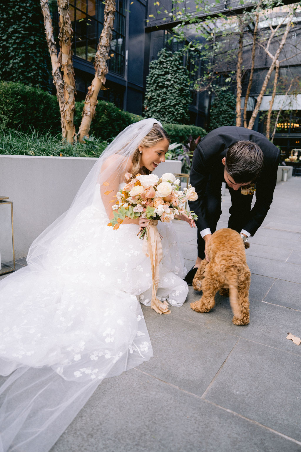 Couple greeting their dog outside their wedding at the Winslow, Baltimore